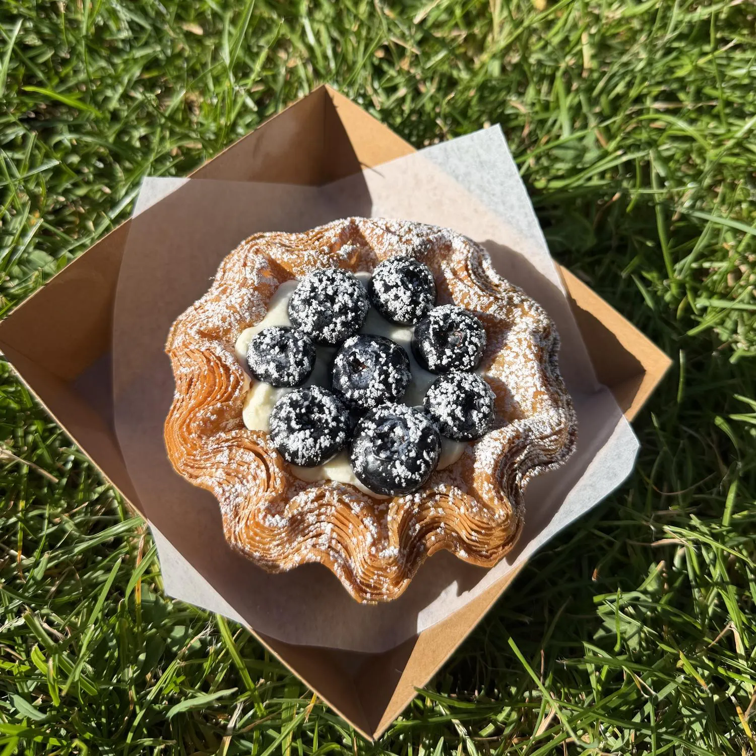 Blueberry cream croissant blossom tart at Crescent & Croissant,an Asian-inspired Patisserie in Woodinville