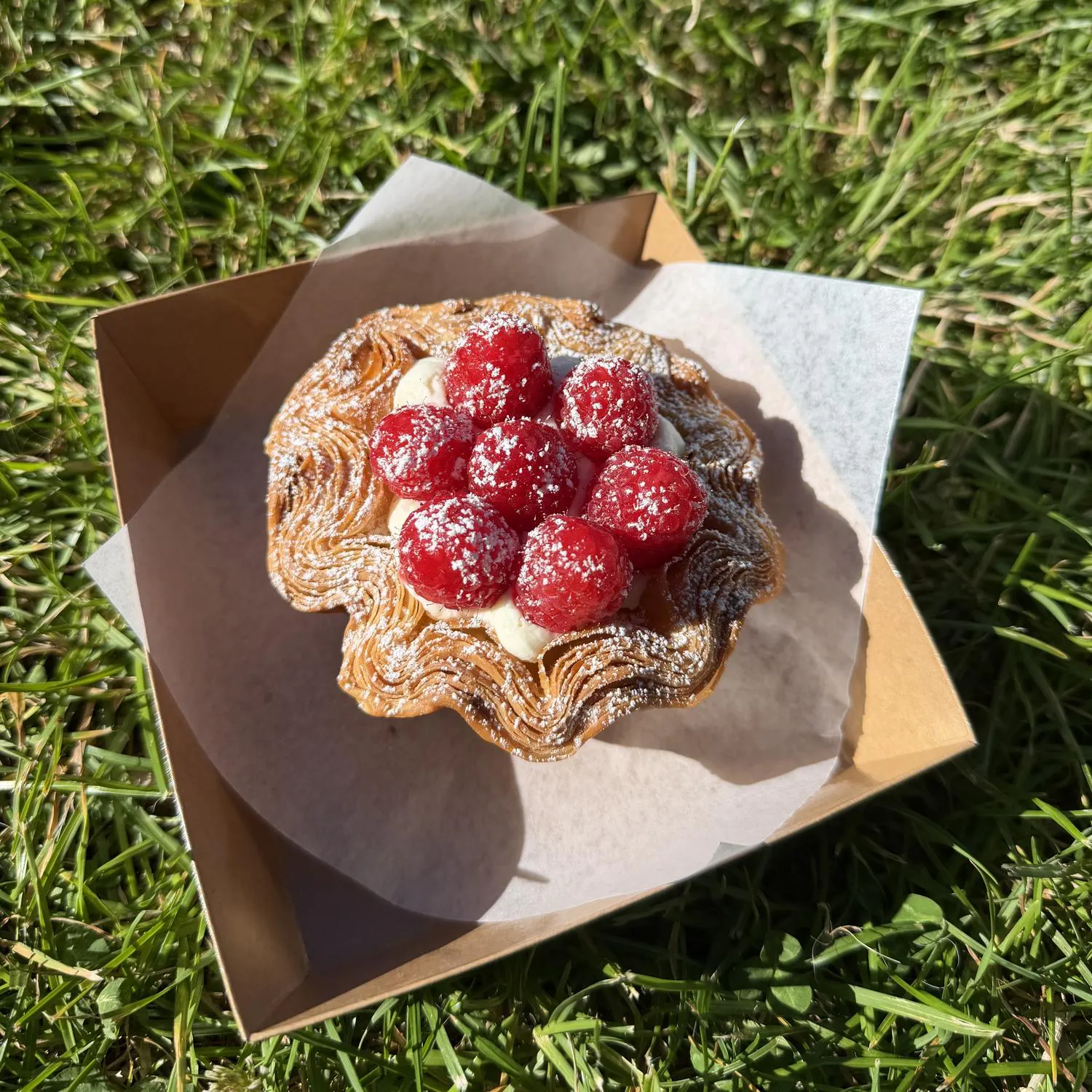 Raspberry cream croissant blossom tart at Crescent & Croissant，an Asian-inspired Patisserie in Woodinville